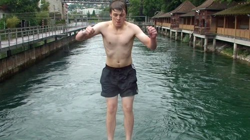 Ash does another back flip into the river
